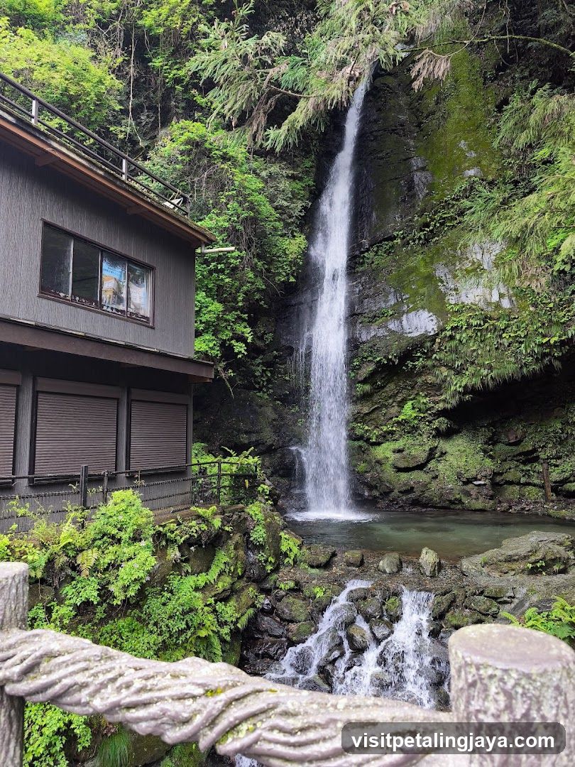 Waterfall and Building Scene