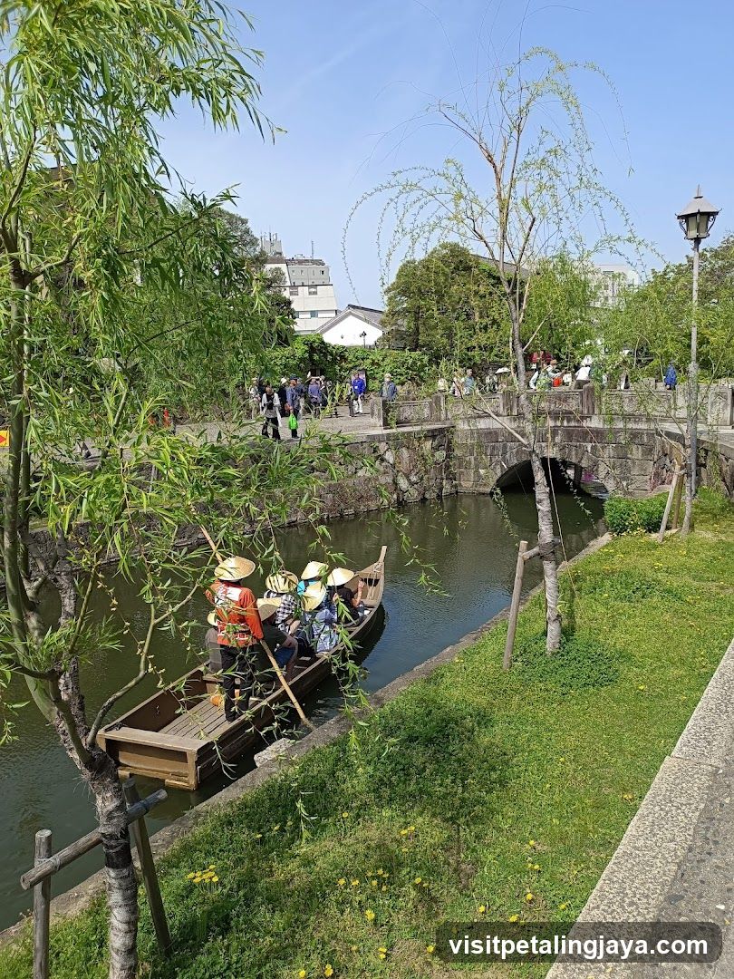 Boat Ride on Canal with Pedestrians