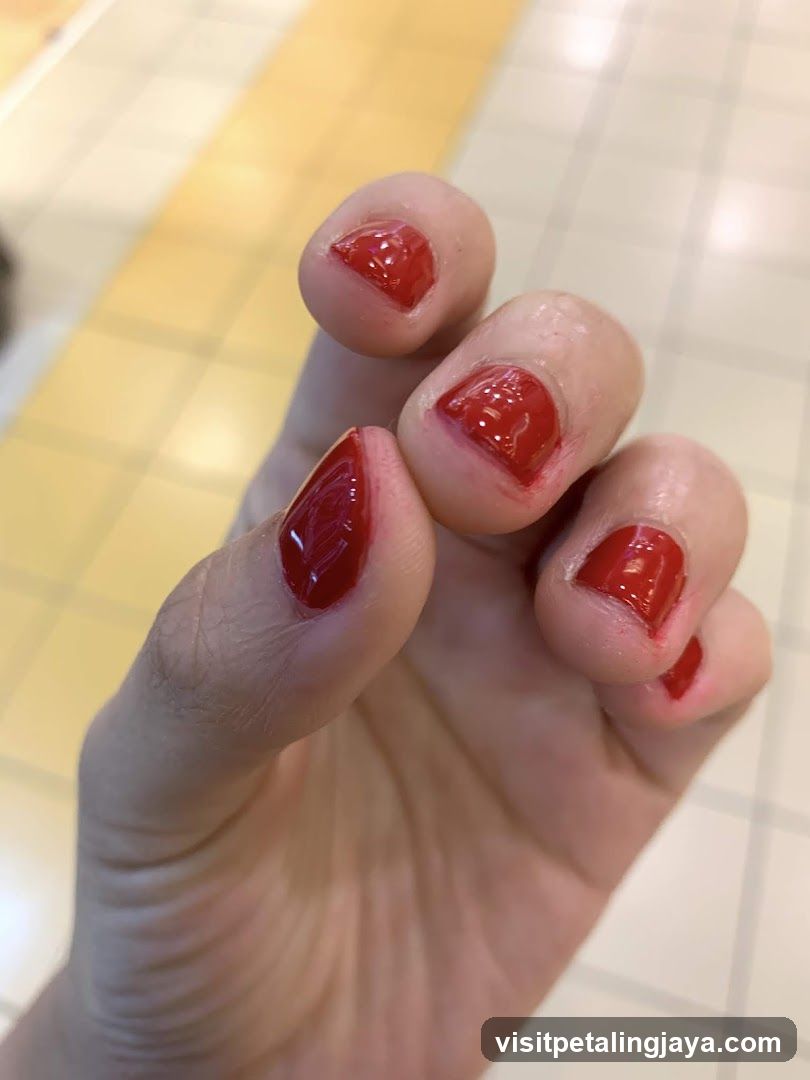 Red Nail Polish Application