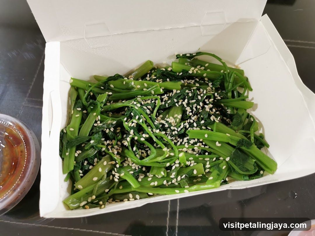Sesame Tossed Greens in Takeout Container