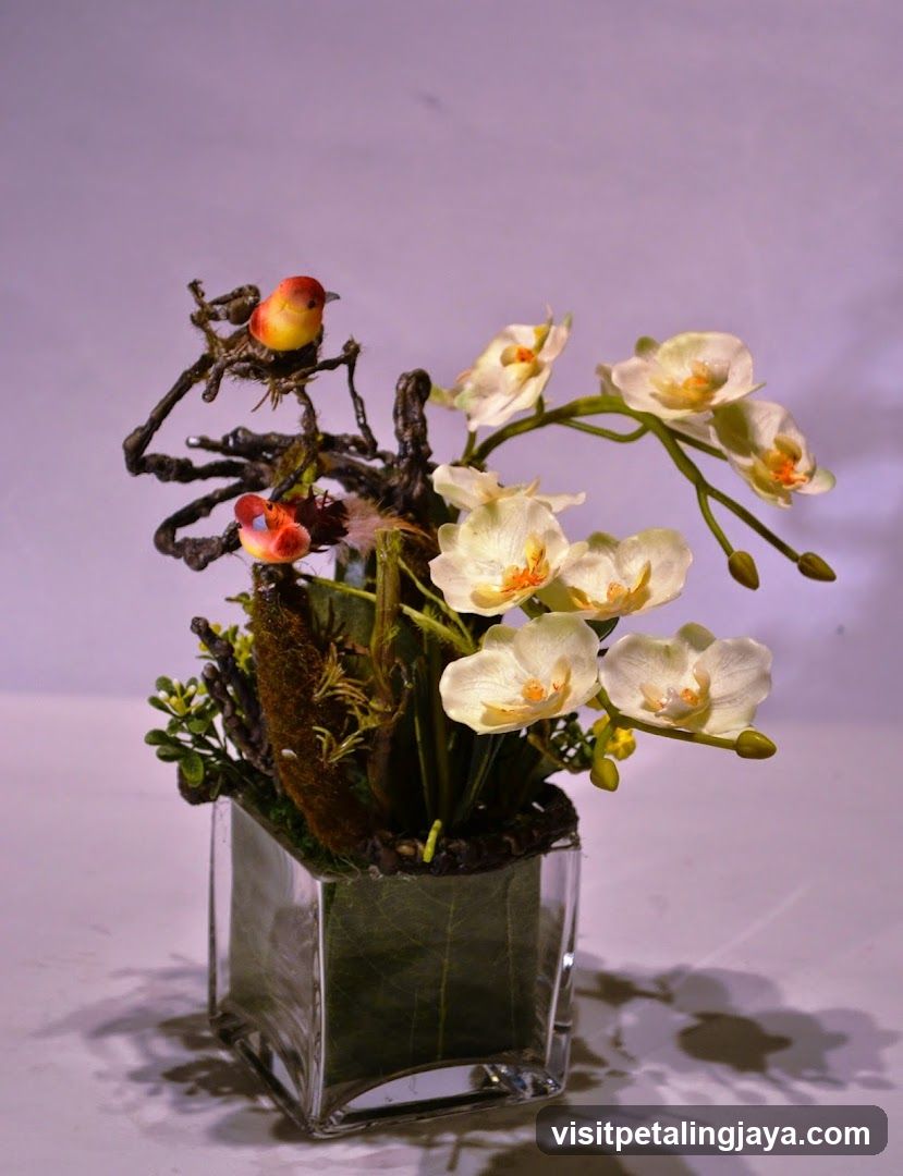 Orchid Arrangement with Bird Sculpture