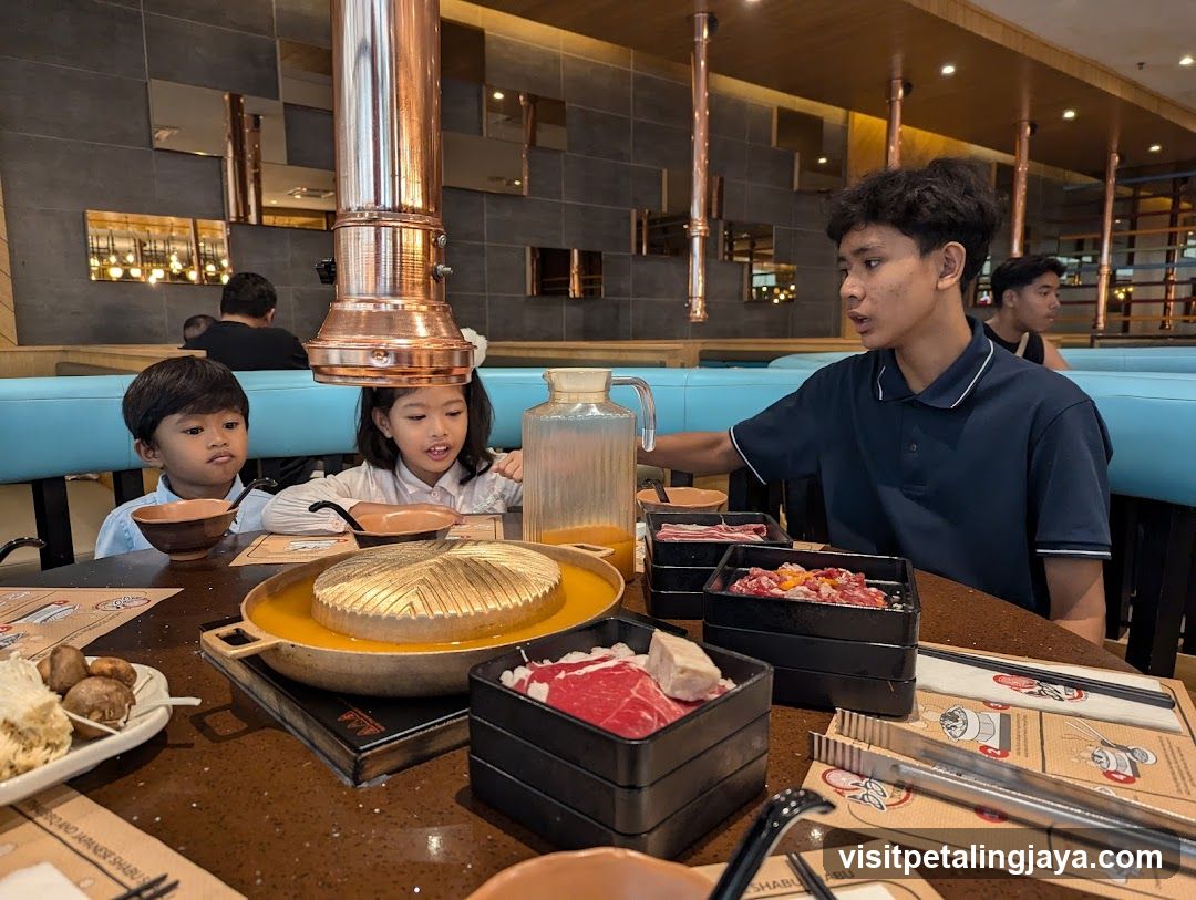 Family enjoying a meal at a restaurant