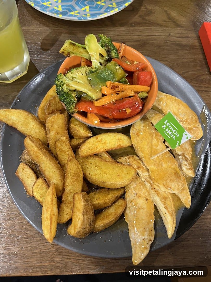 Chicken Strips with Potato Wedges and Vegetables