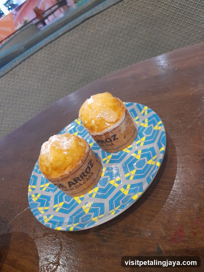Two Muffins on a Decorative Plate