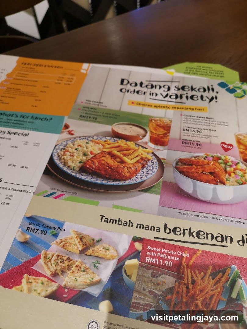 Menu with Peri-Peri Chicken and other dishes