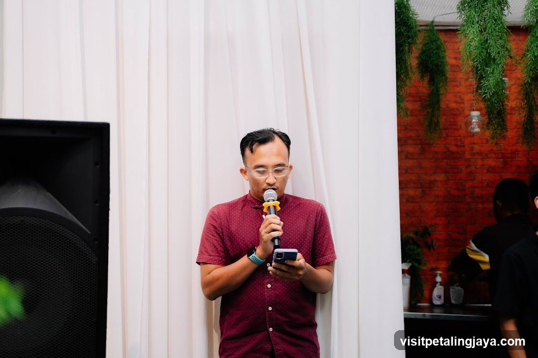 Man speaking into a microphone