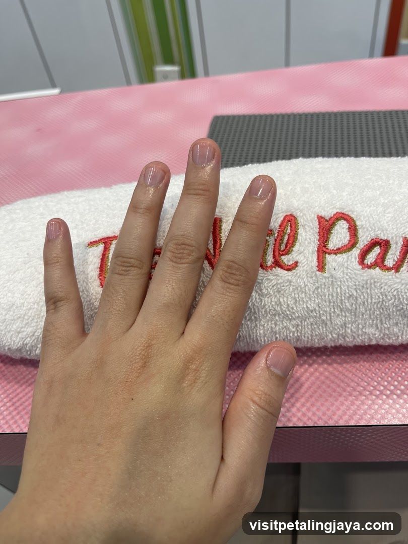 Manicured Hand on Towel