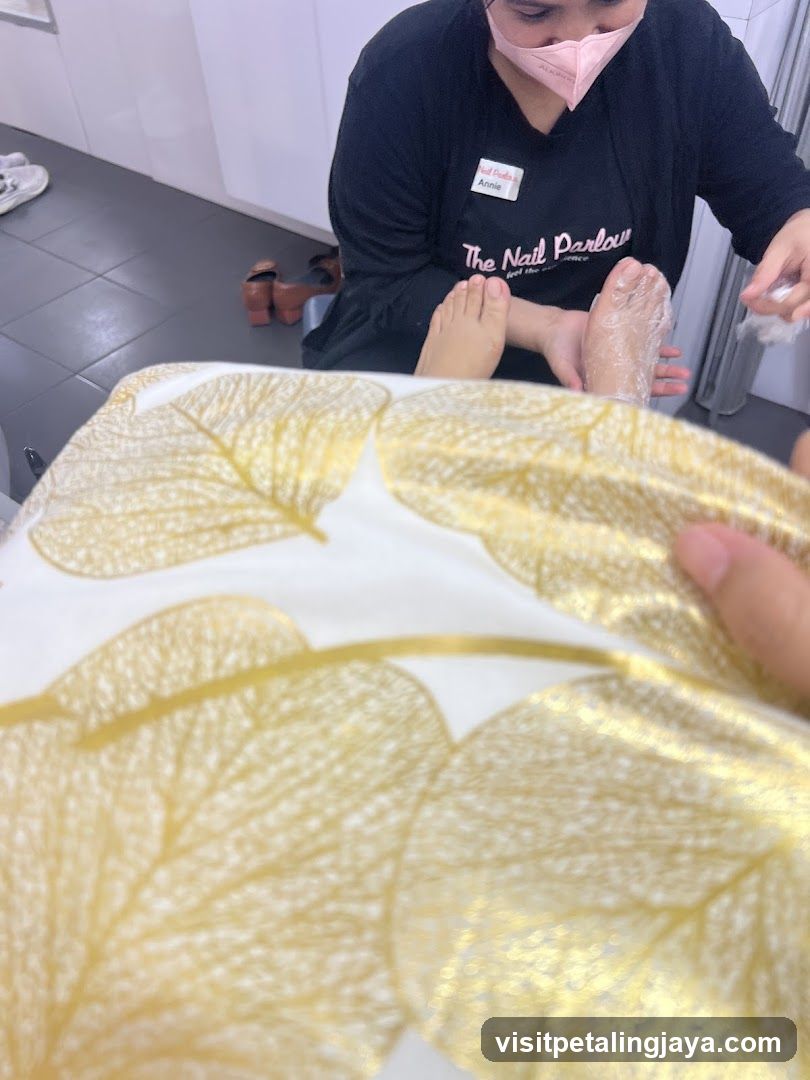 Nail Technician Performing Pedicure
