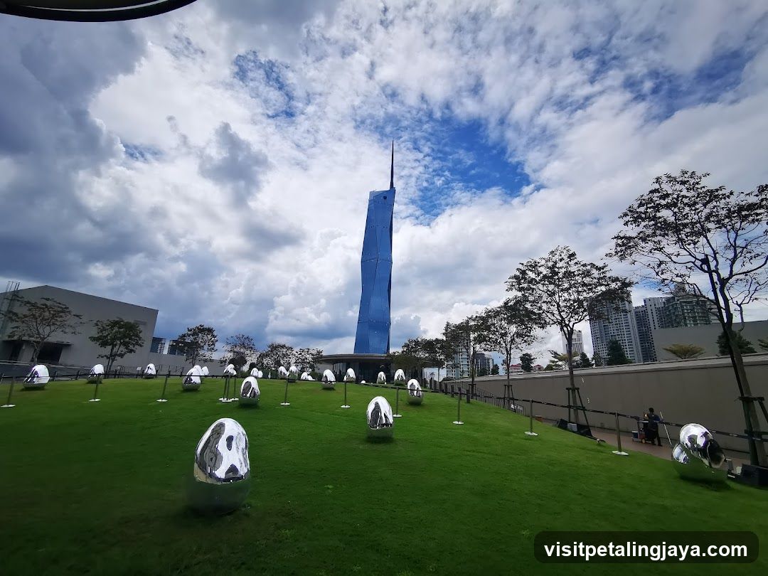 Modern Sculpture Garden with Skyscraper Background