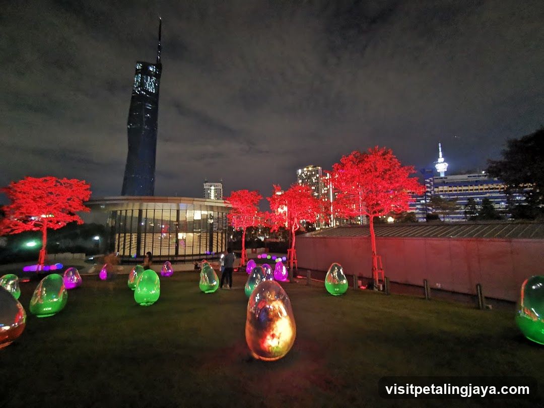 Night Cityscape with Illuminated Trees and Sculptures