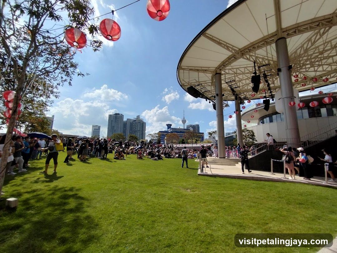Outdoor Event with Crowd and Stage