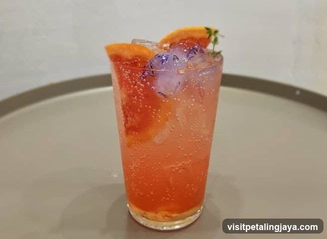 Ginger Punch with Orange Slices and Ice Cubes