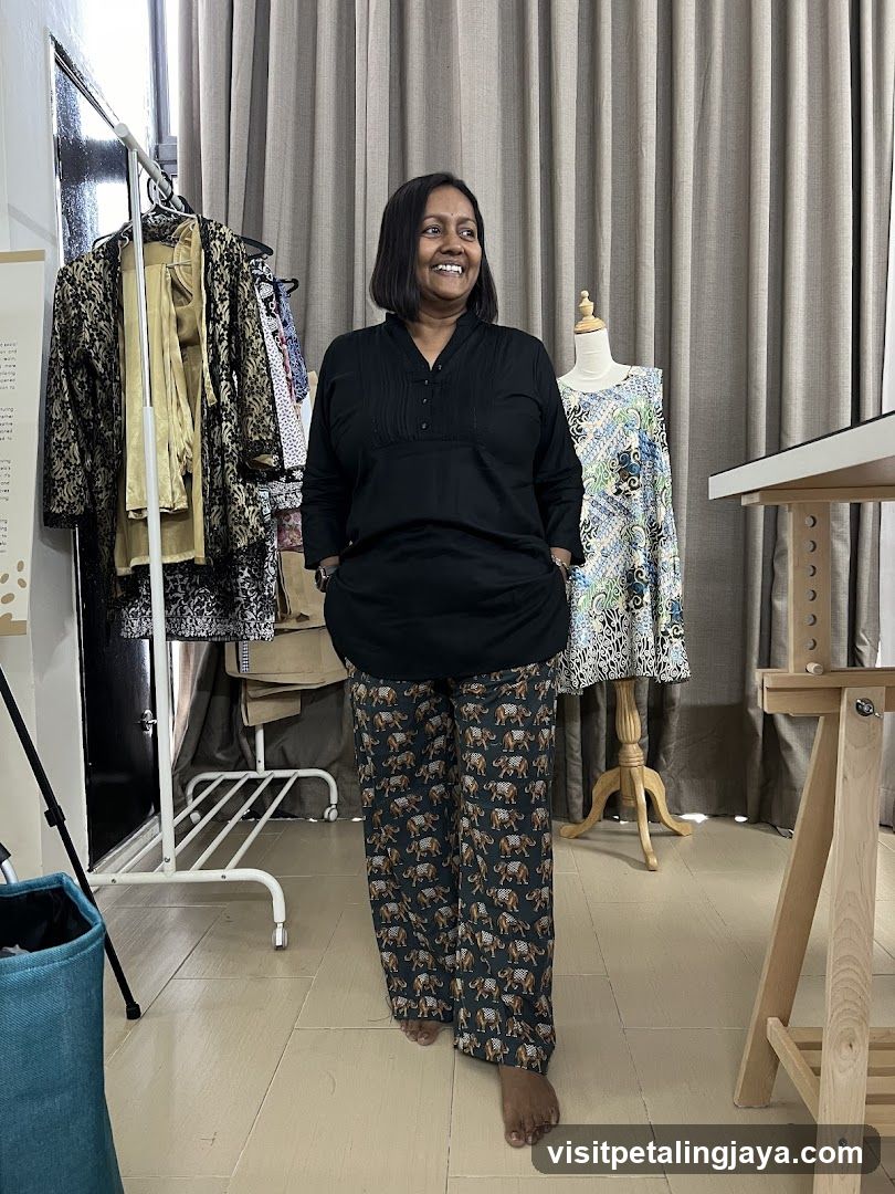 Woman in patterned pants in a studio