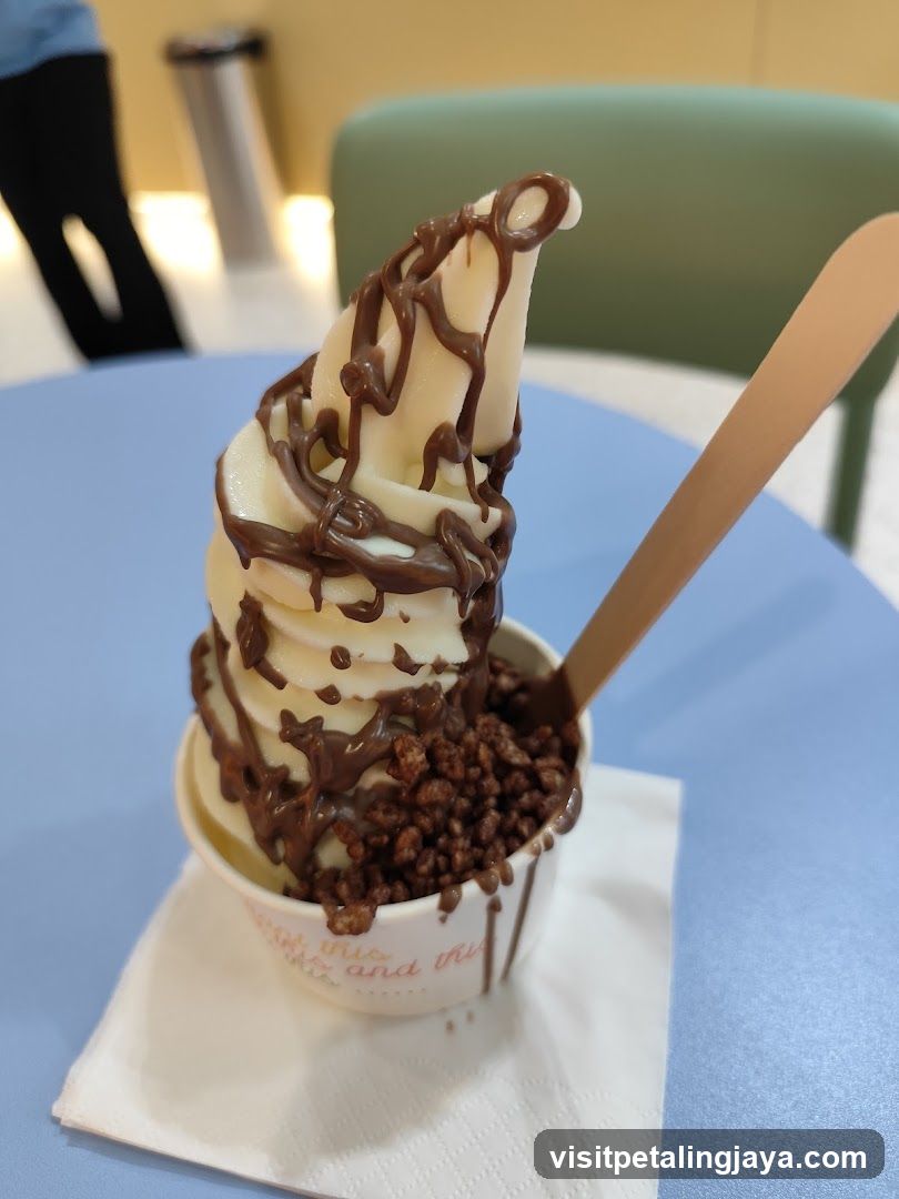 Soft Serve Ice Cream with Chocolate Drizzle and Cereal