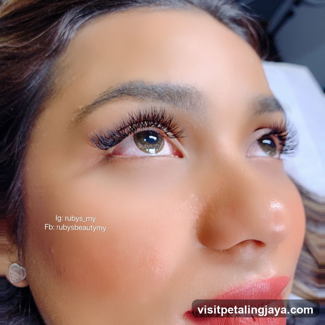 Close-up of a woman's eye with eyelash extensions