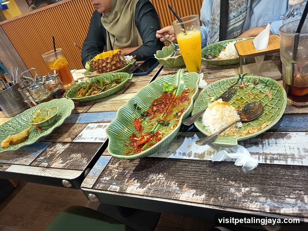 Table with partially eaten food and drinks