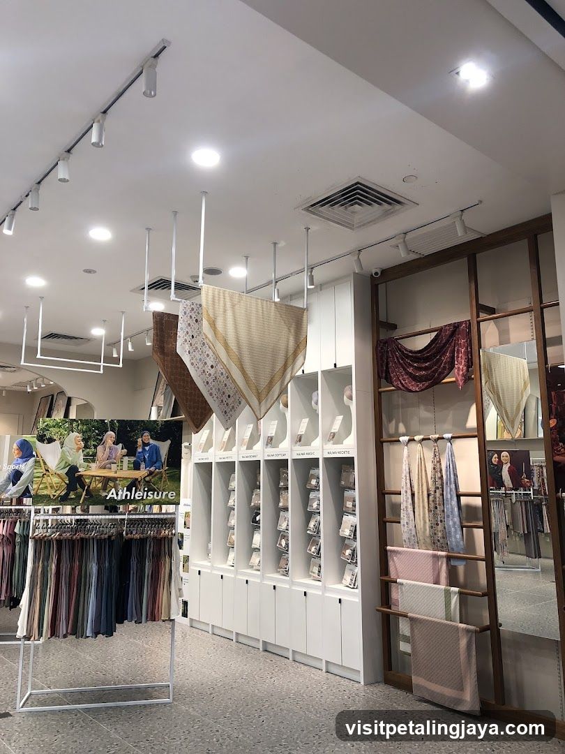 Clothing store interior with scarves and apparel