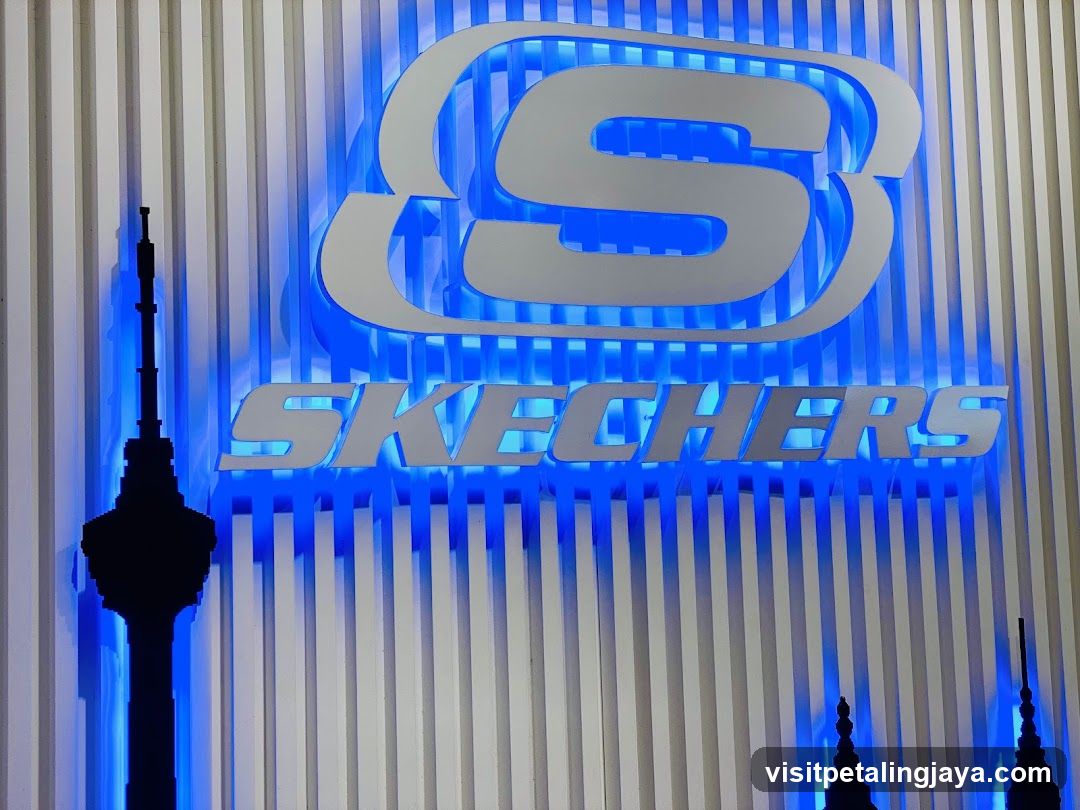 Skechers Logo with City Skyline Silhouette