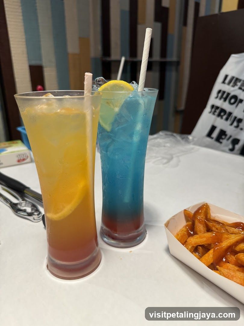 Colorful Drinks and Fries at a Restaurant