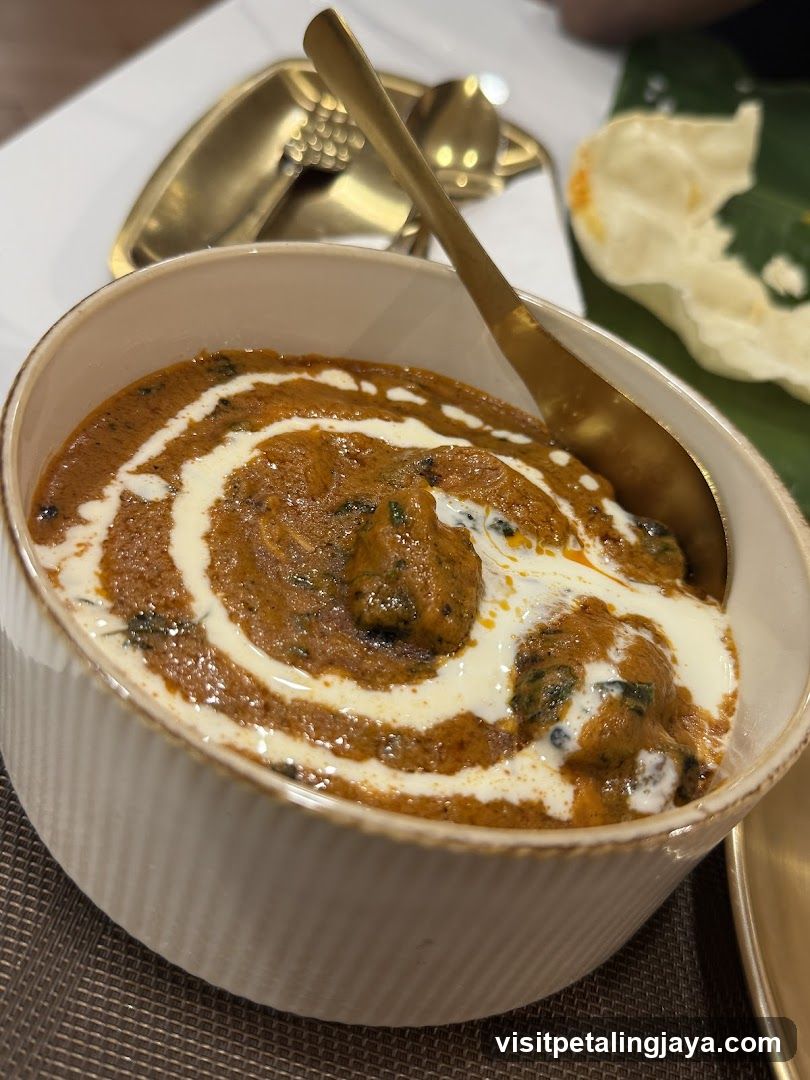 Bowl of Curry with Cream Swirl
