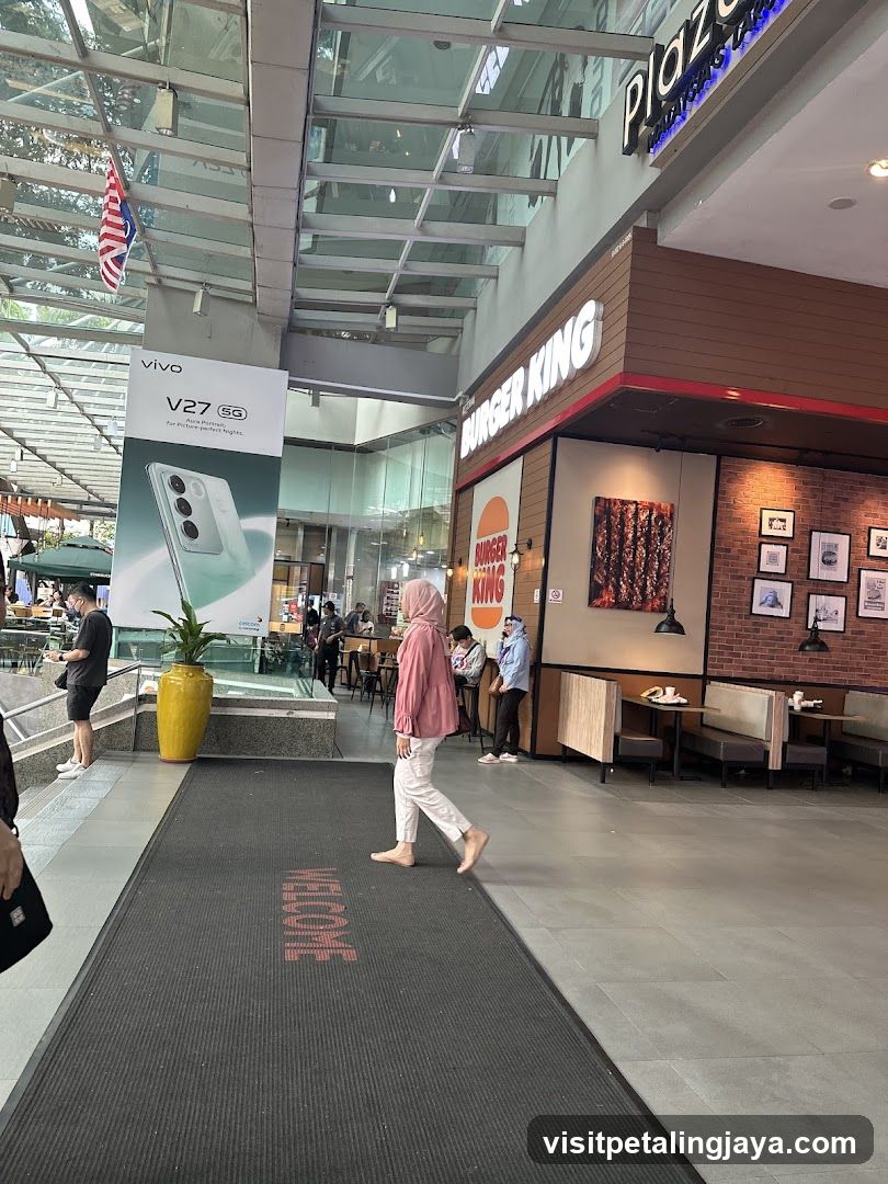 Shopping Mall Entrance with Burger King and Vivo Advertisement