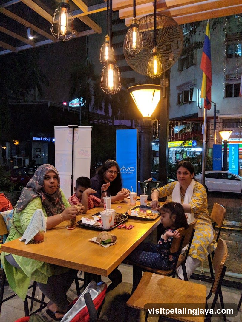 Family Dining at Outdoor Cafe