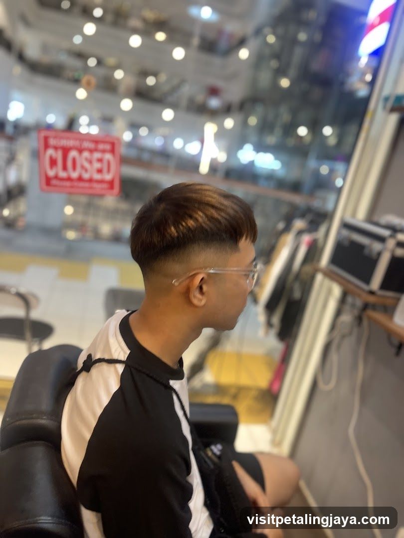 Barber Shop Interior with Customer Seated