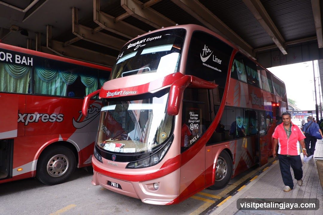 Red Double Decker Bus at Terminal