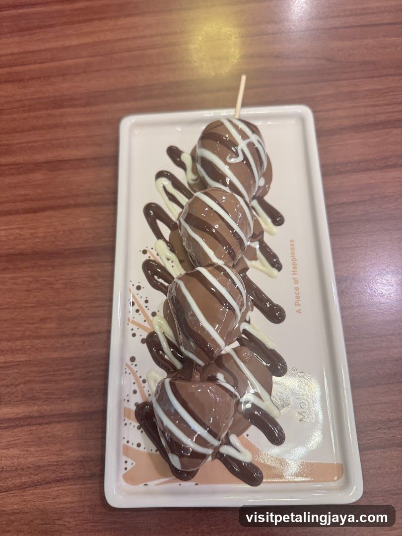 Chocolate-dipped fruit skewer