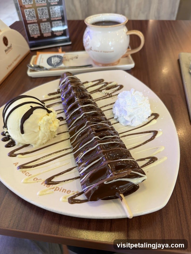 Chocolate-covered ice cream bar with whipped cream and coffee