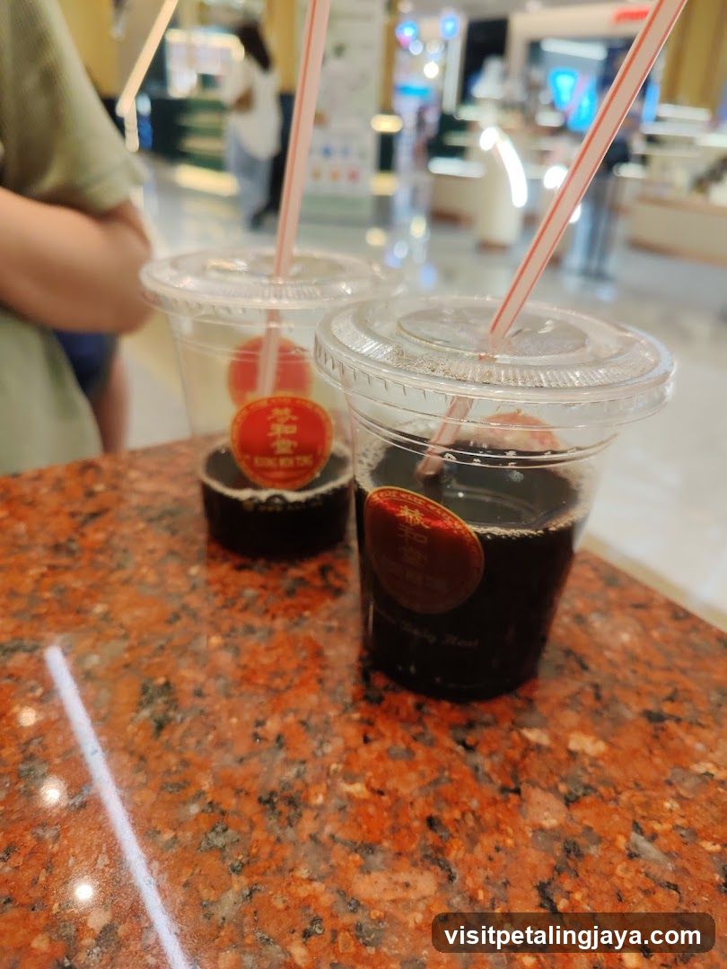 Two drinks with straws