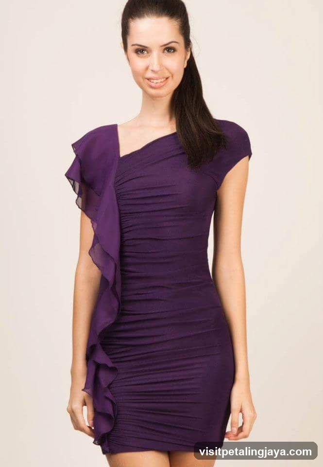 Woman in purple dress