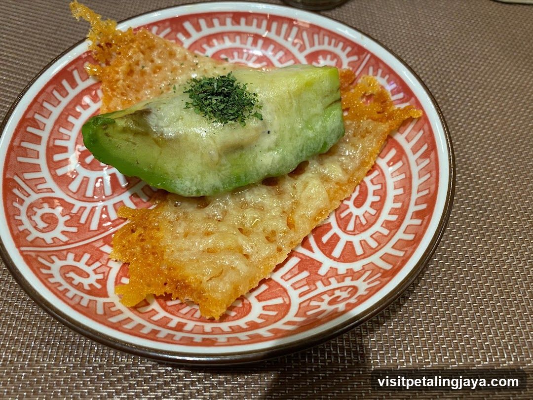 Avocado and Cheese Crisps on Patterned Plate