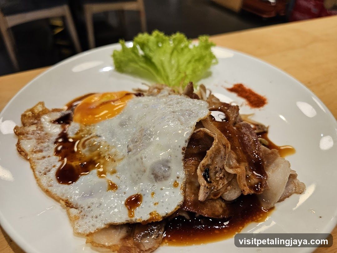 Fried Egg with Meat and Sauce