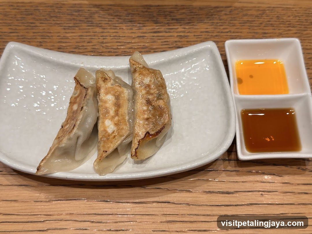 Gyoza with dipping sauces