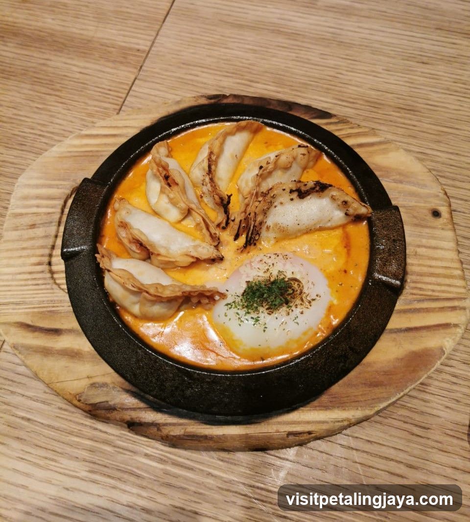 Stuffed Dumplings with Creamy Sauce and Egg