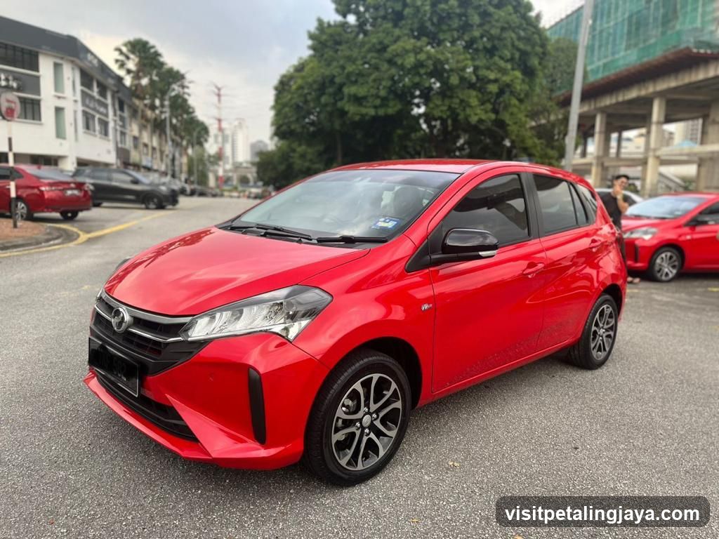 Red Proton Saga on street