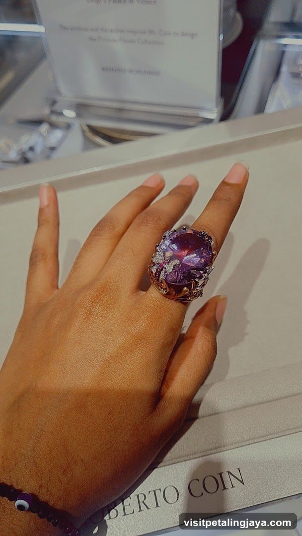 Jewelry Display with Purple Gemstone Ring