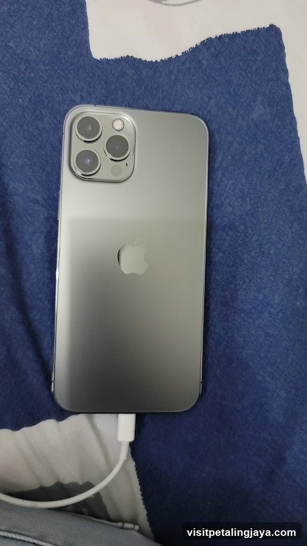 iPhone on blue fabric
