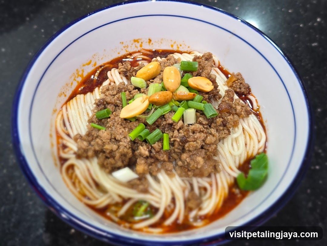 Bowl of Noodles with Meat Sauce and Peanuts
