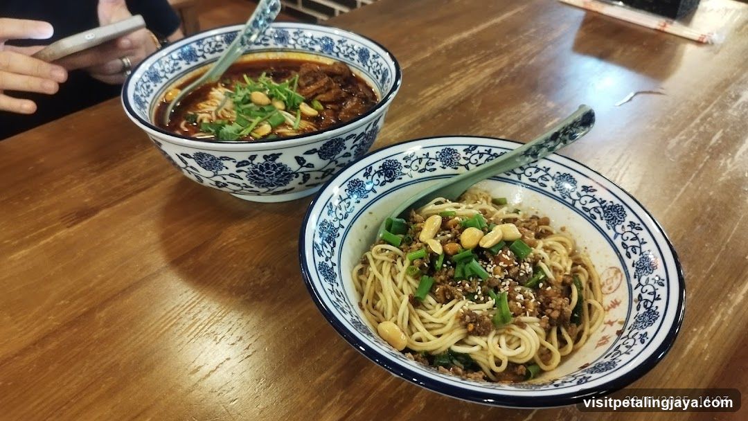 Noodle Bowls on Wooden Table