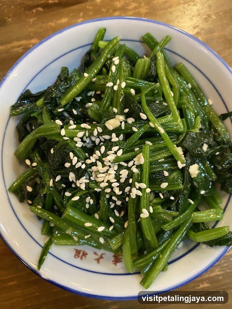 Stir-fried greens with sesame seeds