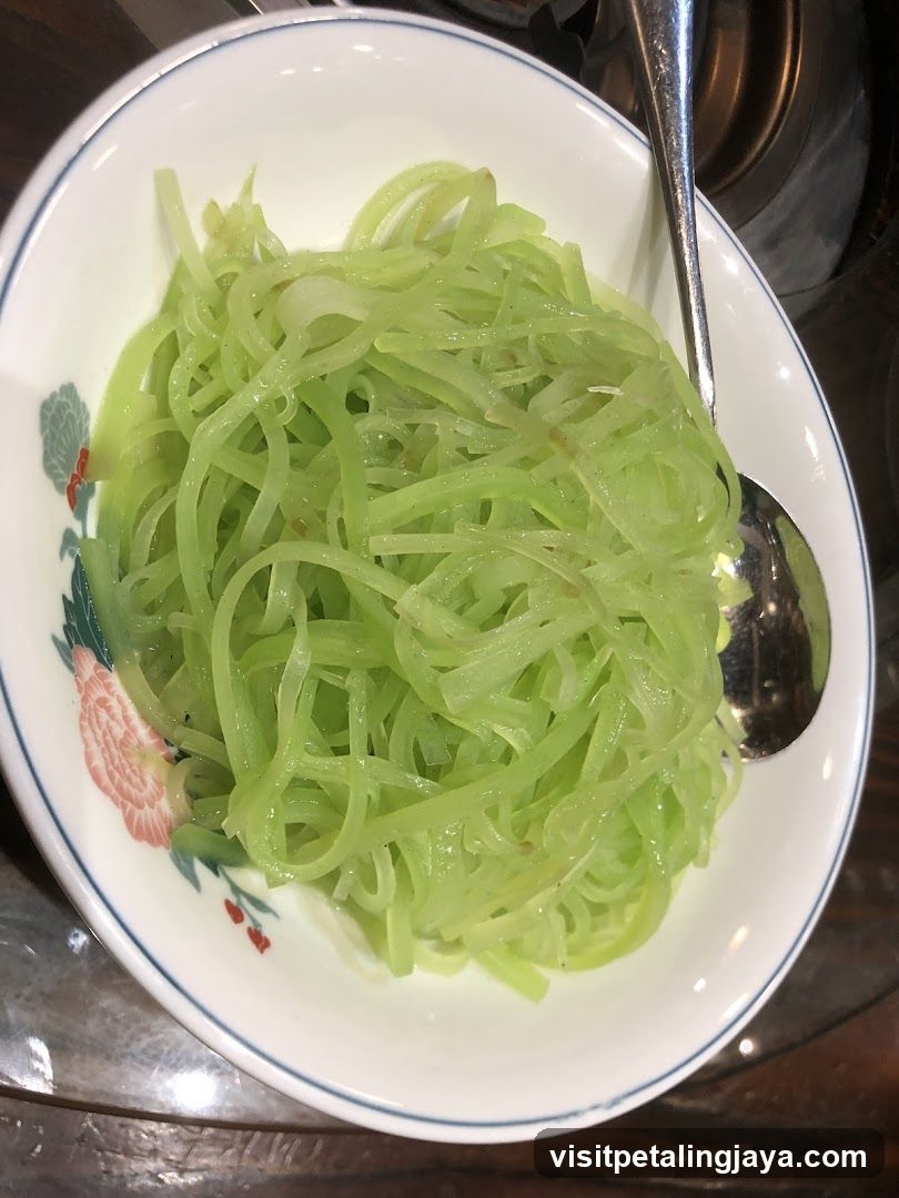 Bowl of stir-fried green vegetables