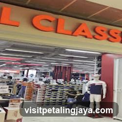Interior of a retail store with signage above entrance