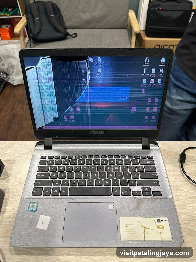 ASUS Laptop with Screen Damage