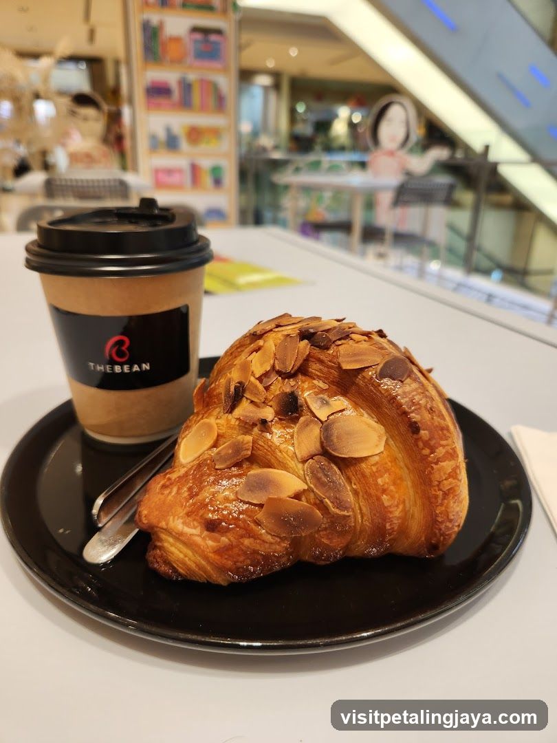 Almond Croissant and Coffee