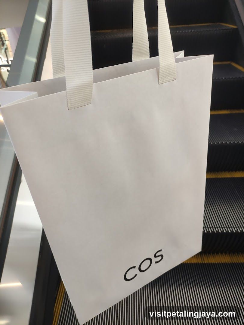 Shopping bag on escalator
