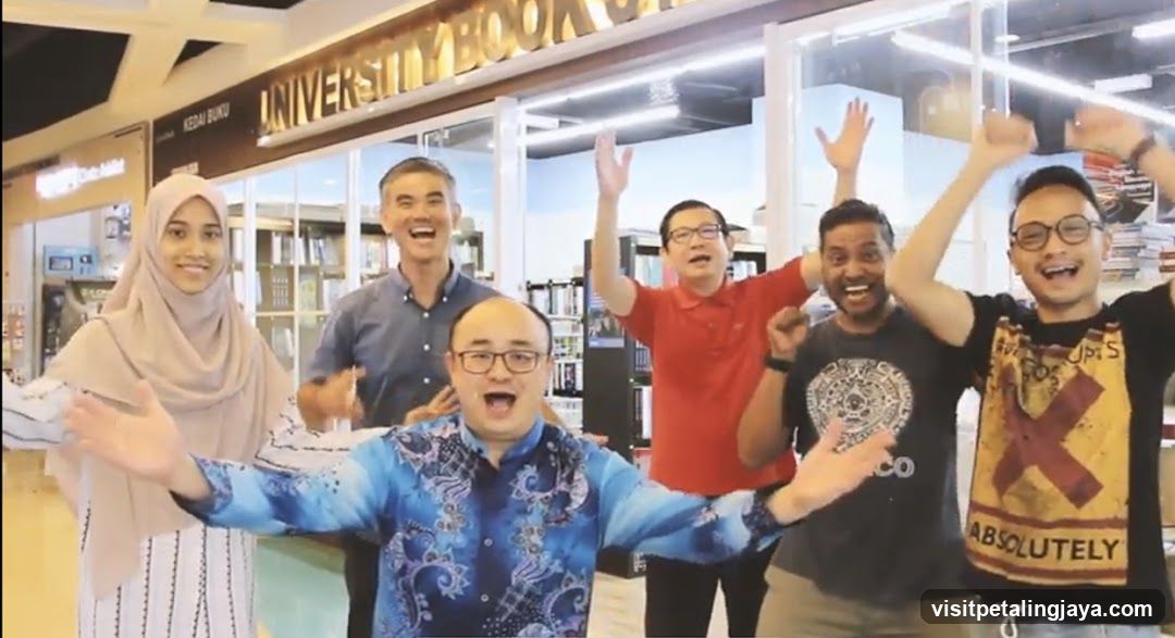 Group celebrating in a bookstore