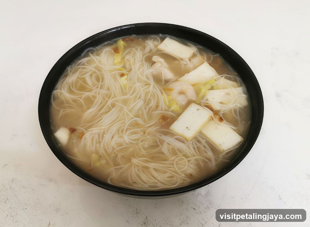 Bowl of Noodle Soup with Tofu and Shrimp