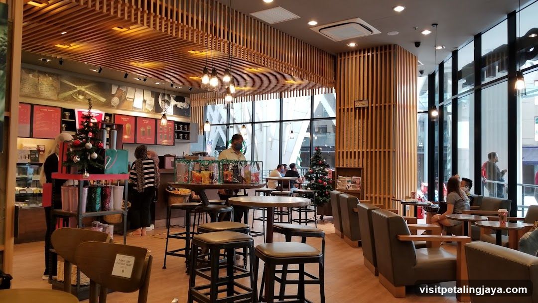 Coffee Shop Interior with Wooden Decor and Staff